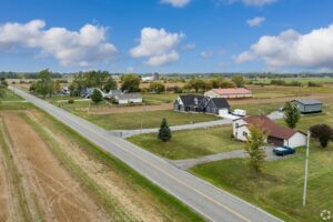 Aerial view of homes and farmland in Cambria, New York